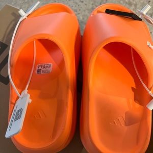 YEEZY SLIDES -BRAND NEW IN BOX - ORANGE!!! Ordered for son and are too small.
